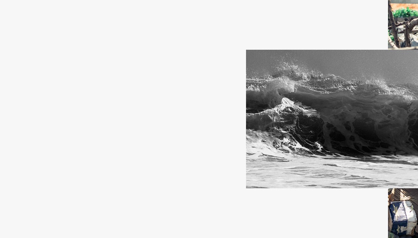 Waves crashing on rocky beach.