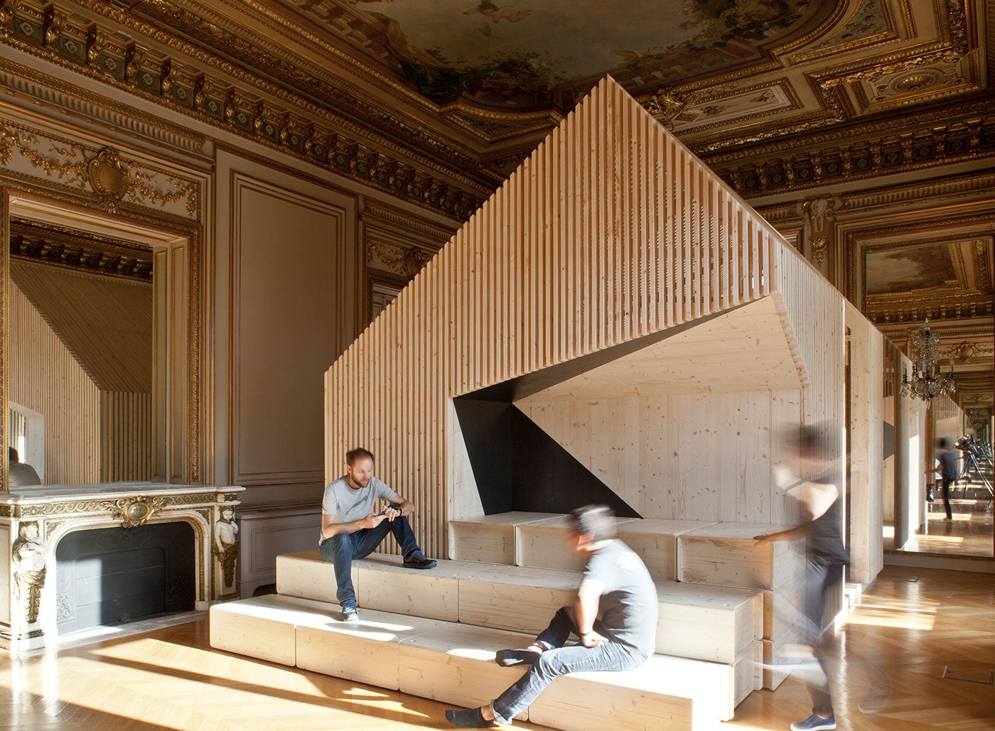 <strong>EKIMETRICS: PARIS | </strong>Estelle Vincent Architecture erected standalone wooden structures to serve as private meeting spaces in the gilded offices of this consulting firm on the Champs-Élysées