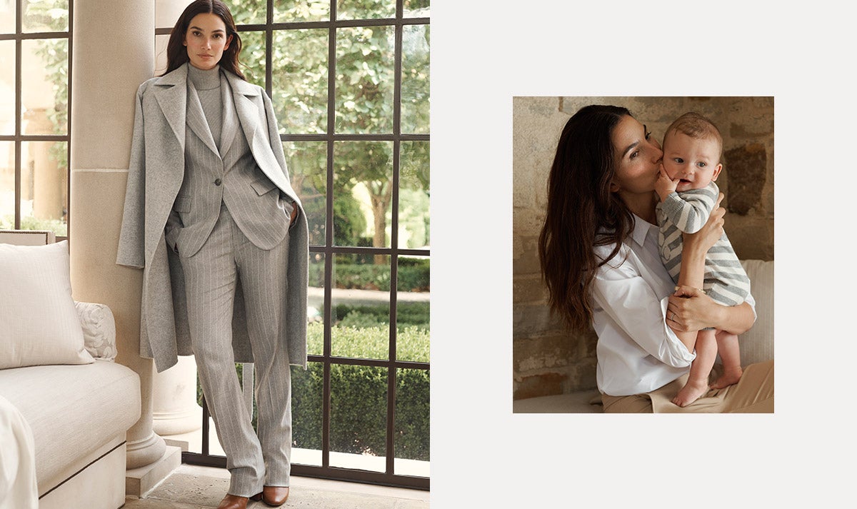 Woman wears light grey pinstripe suit under long grey coat.