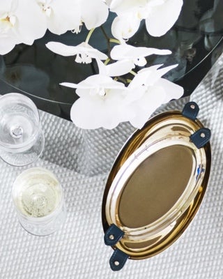 Serving trays with navy leather accents