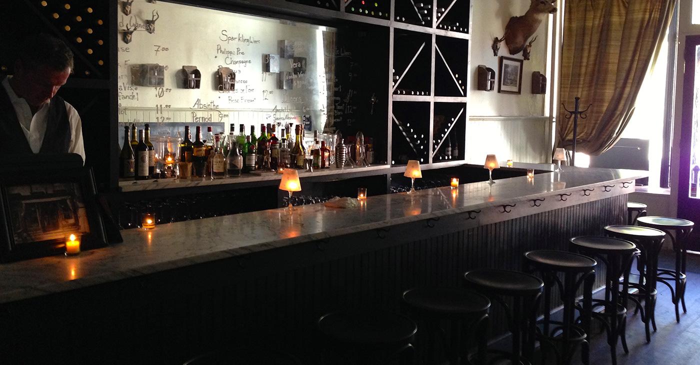 Drink delicious wines and old-fashioned cocktails in this cozy, Ernest Hemingway–inspired bar
