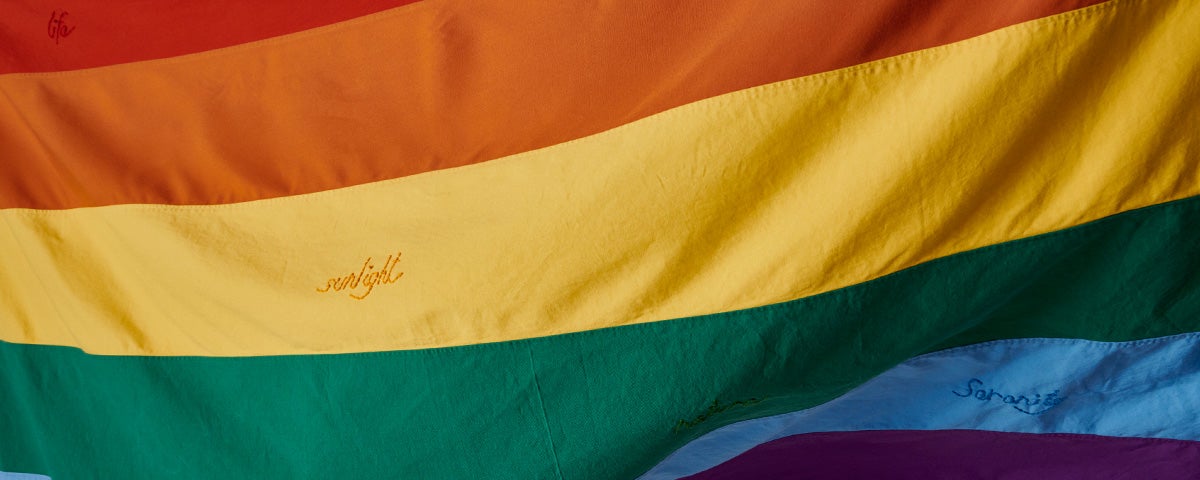 Close up photograph of rainbow flag