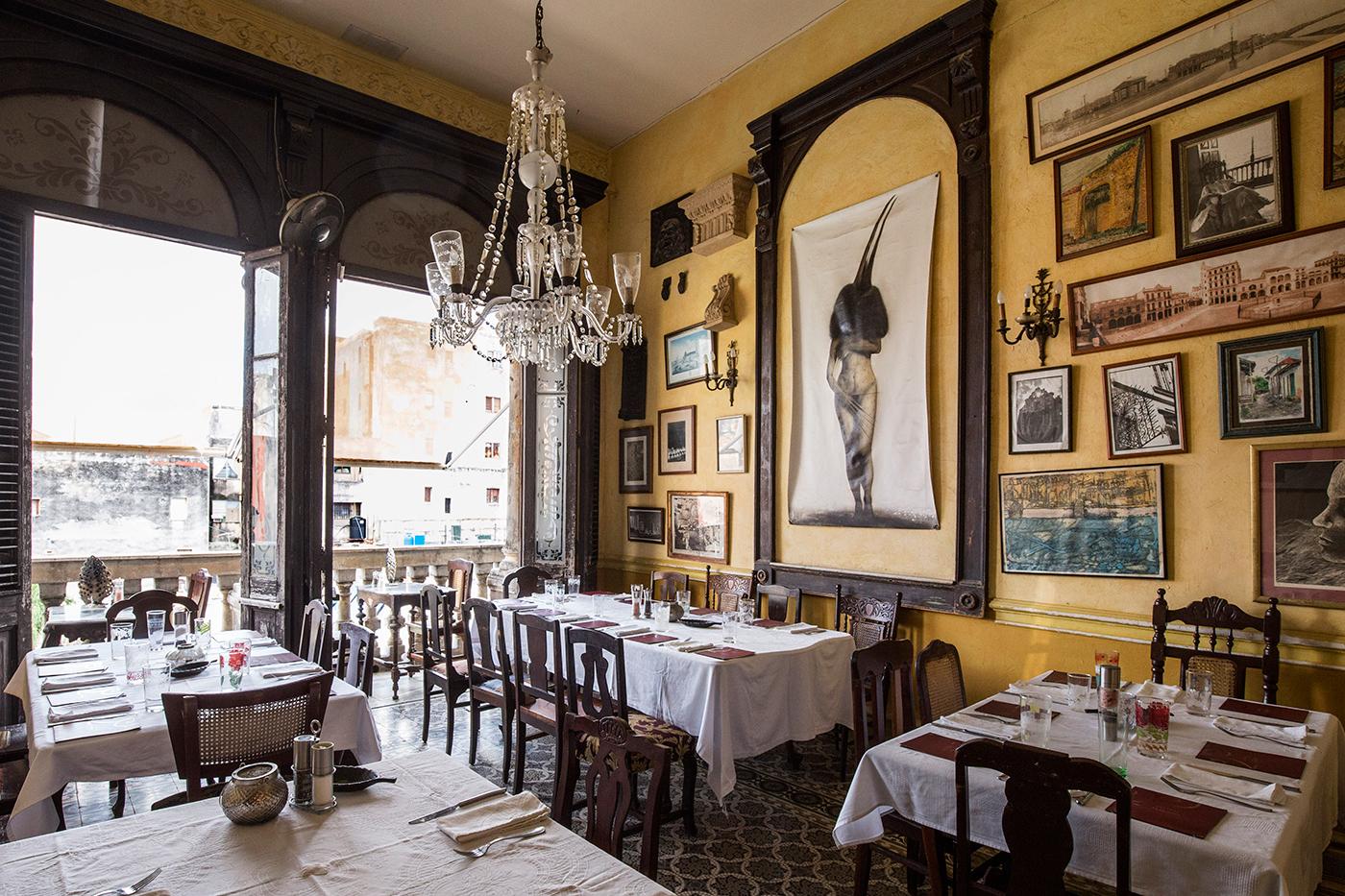 Climb a dilapidated marble staircase to get to La Guardia, a uniquely Cuban fine-dining experience