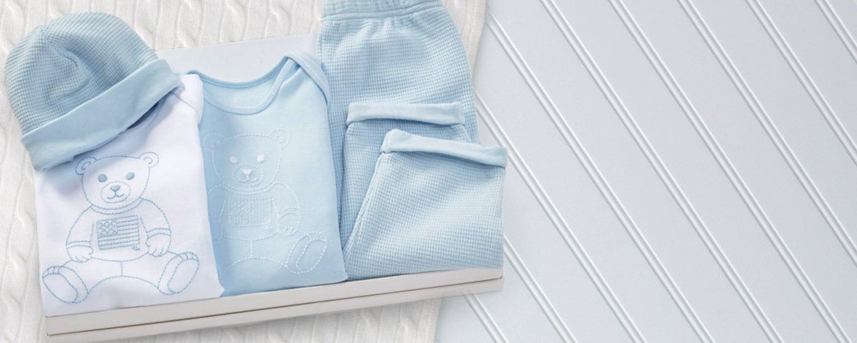 Gift set of baby clothes in light blue