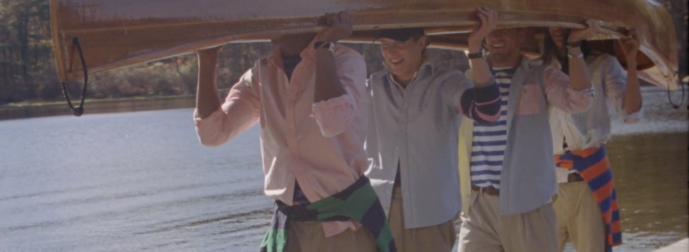 Video of models in Polo attire on dock and on cabin porch.