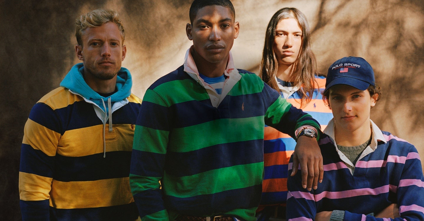 Men in rugbys in different colors, layered over tees & hoodies