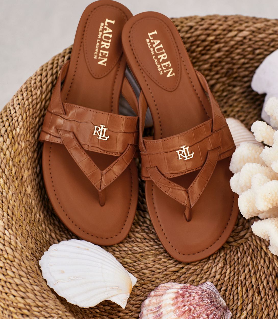 Tan leather thong sandals.