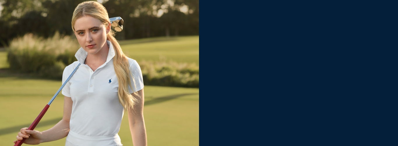 Kathryn Newton in white golf Polo & skort