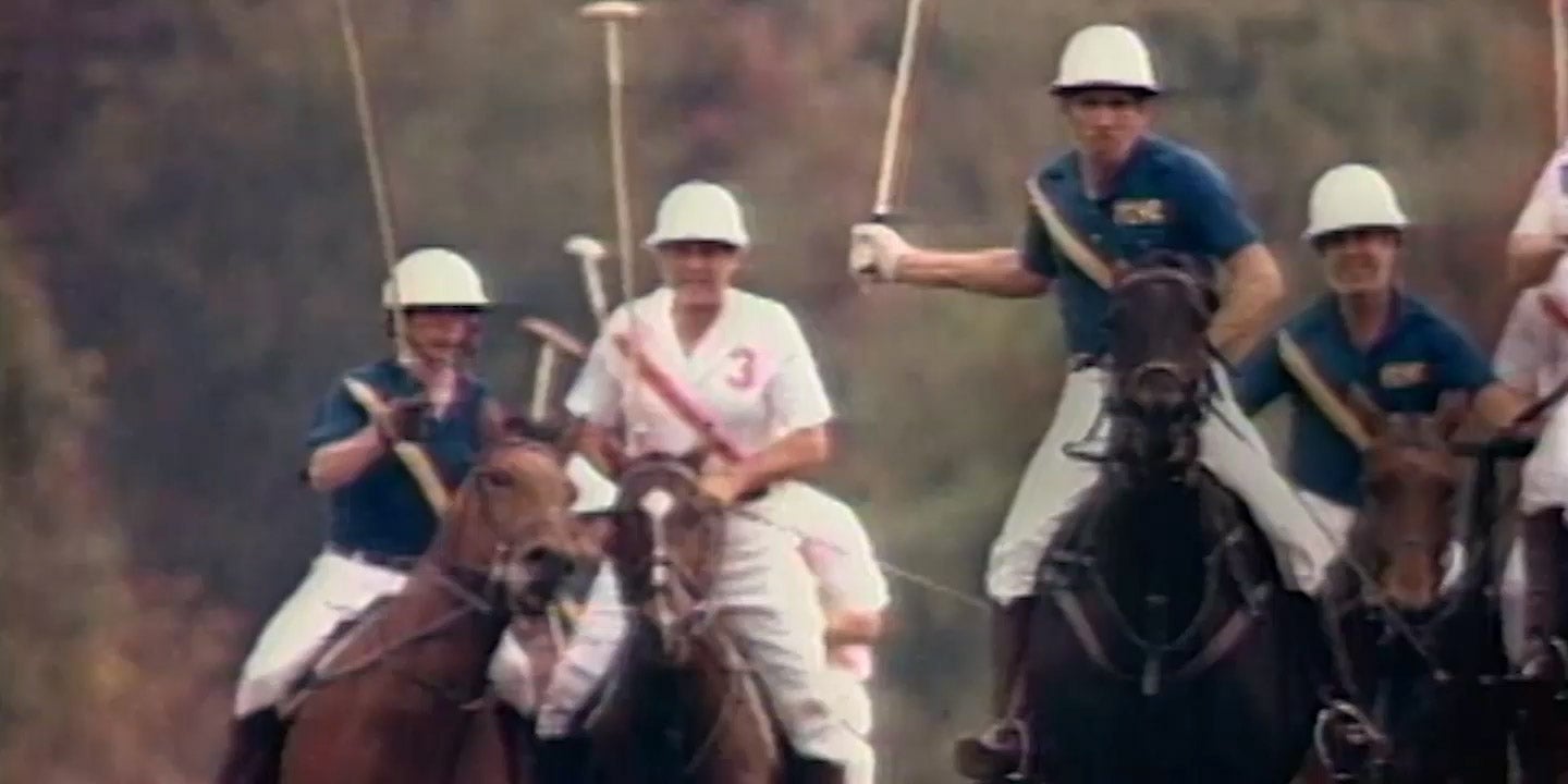 Watch with Polo Player on face and green dial.