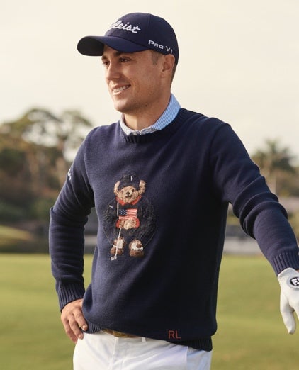 Justin Thomas on green Polo Bear golf crewneck