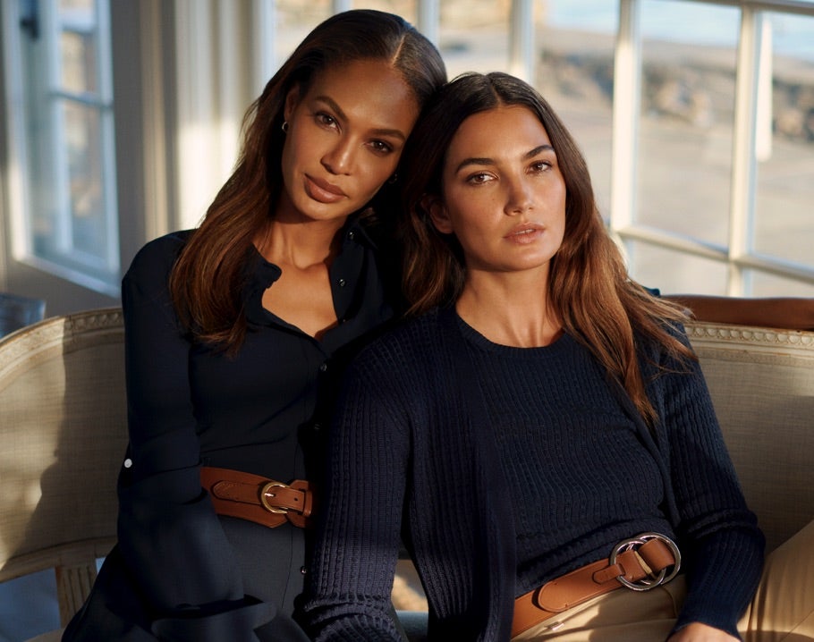 Joan Smalls and Lily Aldridge wear navy Lauren outfits.